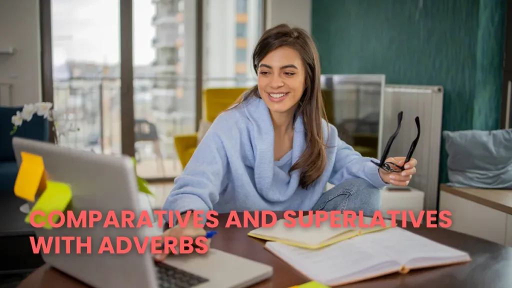 Student at a laptop learning French comparatives and superlatives with adverbs.
