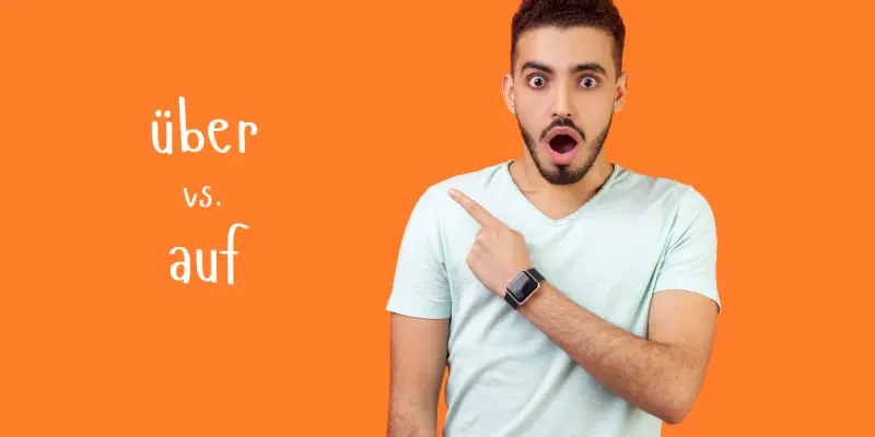 Man comparing the German prepositions über and auf with accusative and dative cases.