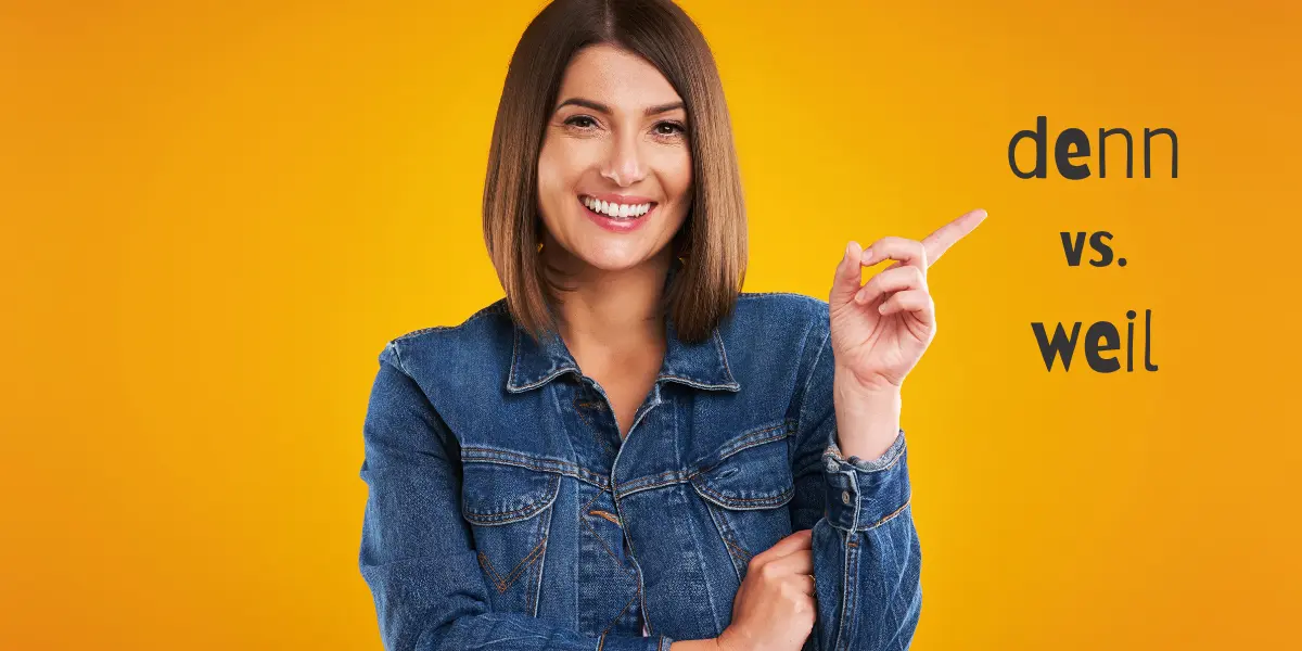 A cheerful woman points to the board as she learns the distinction between 'denn' and 'weil' in German.