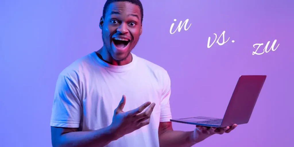 A man excitedly holds a laptop, learning when to use 'in' and 'zu' in German sentences.