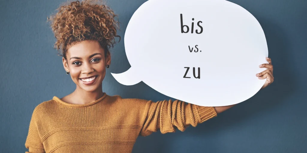 A smiling woman holds a speech bubble while learning the difference between 'bis' and 'zu' in German, focusing on time and distance expressions.