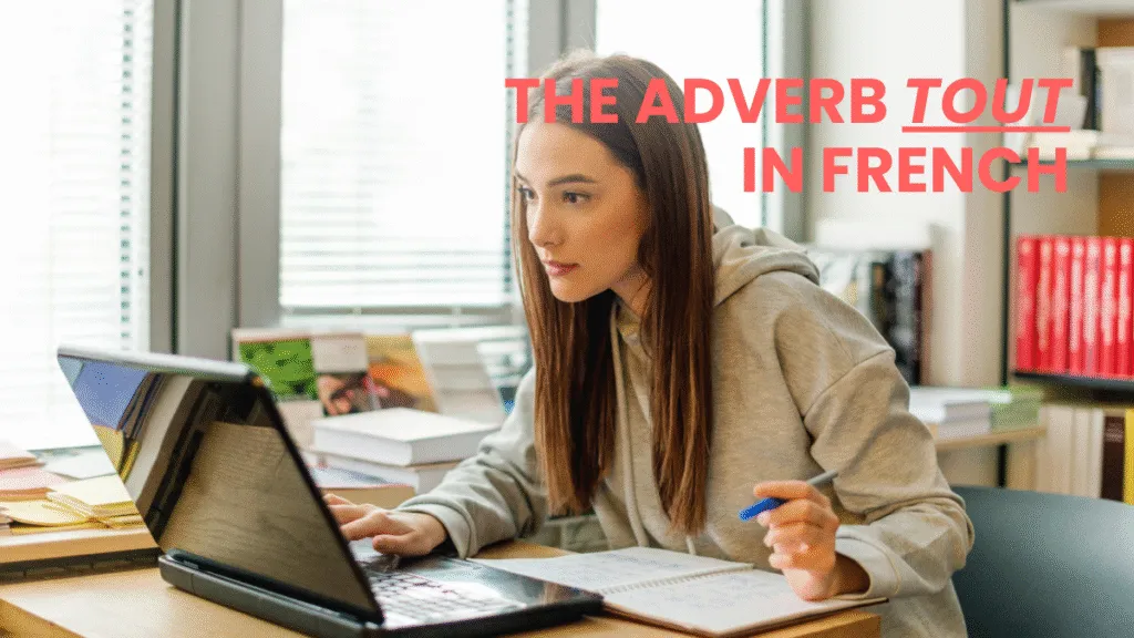 Student learning the adverb tout in french during a study session.